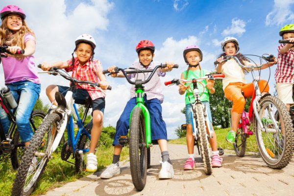 children-with-helmets-riding-bikes-iStock-508726663-web-ready-1024x495