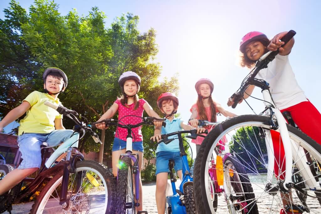 family-riding-bikes-safely