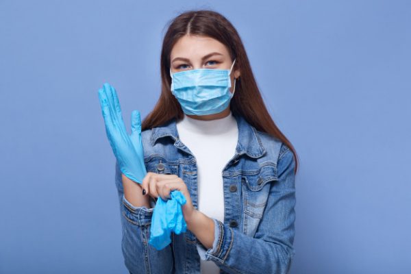 teenager-woman-with-surgical-mask-gloves-coronavirus-prevention_176532-103