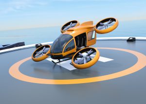 Orange self-driving passenger drone takeoff from helipad. 3D rendering image.